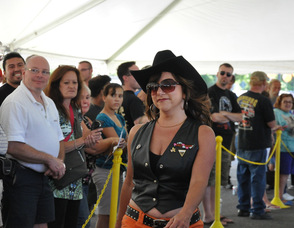A Daisy Duke look-a-like sports sunglasses.