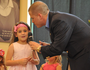 Thomas S. Russo, Jr. with Payton Reese Goldschmidt.