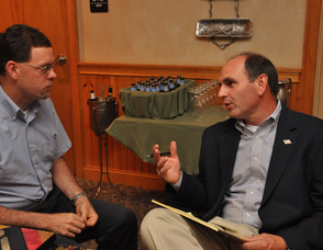 Andy Ball (left) speaks to former Sussex County Freeholder, Glen Vetrano, at The Dining Room in Sparta. Vetrano was there among supporters for Dennis Mudrick.