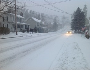 Trinity Street in Newton as snow falls this afternoon.