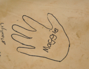 Maggie Fisher's handprint on the flip side of the "HOPE" Mural.