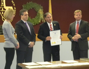 Members of the NPBA receiving the resolution