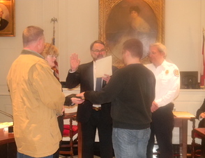 Volunteer Firefighter Colin Dunne being sworn in