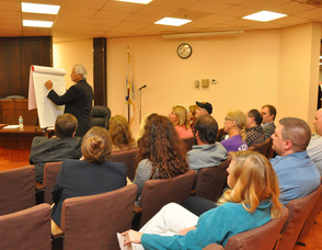 Stuart Koperweis asks the group questions.