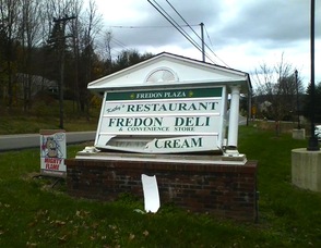 Sign for the Fredon Plaza damaged by Hurricane Sandy.