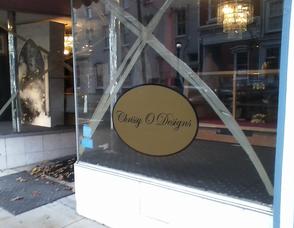 Chrissy O Designs, with windows taped up.