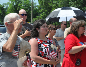 The crowd at attention during "The Star Spangled Banner", including Town of Newton Mayor Helen Le Frois.