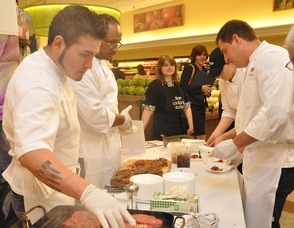 Chef Bill Zucosky and staff preparing Prime New York Strip Steak.
