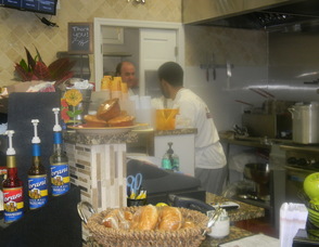 One of his employees preparing food