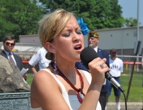 Mary Adams sings "God Bless America".