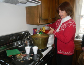 one of the Historical Society members making cider