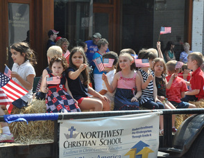 Northwest Christian School students wave their flags.