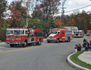 The Hopatcong Fire Department rides at the end of the parade.
