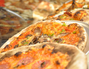 An assortment of pizza.