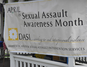 Information in the gazebo from DASI, Ginnie's House, and the Sussex County Prosecutor's Office.