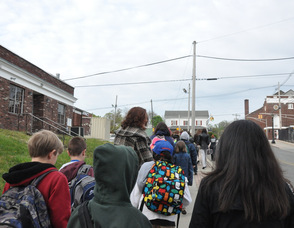 The group walks up Union Place.