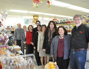 Inside the store, from back to front:  Frankford Township Mayor Gary Larson, Linda Barry Member Services Coordinator of the Sussex County Chamber of Commerce, Eileen Diehl from Lakeland Bank, Cody Halligan,Pat Halligan-Kissel owner,  Tammie Horsfield President of The Sussex County Chamber of Commerce, Gabrielle Gudd of The New Jersey Herald, Rose Marie Paolucci of Valpak,  and Don Hall from The Chatterbox.