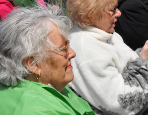 Janice Hunts of the Shade Tree Commission watches the festivities.