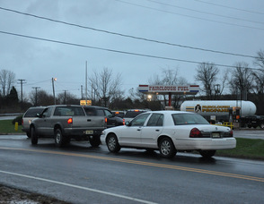 Cars wait at Fairclough Fuel, one of the only stations open in the county, for gas.