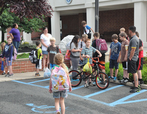 Children wait at the Municipal Building for the Walking School Bus.