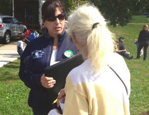 Michelle Casalino, Left, Speaks to West Orange Resident