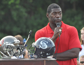 Roman Oben addresses the crowd.