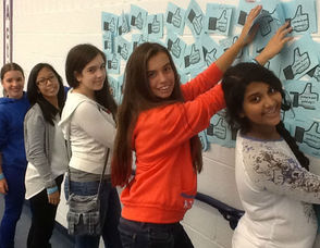 Students Put Pledges Up In Hallway