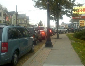 Cars wait bumper to bumper to fill at Newton's Lukoil.