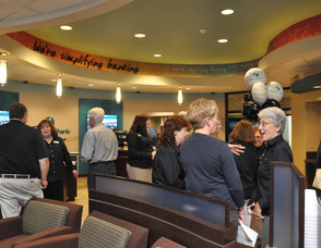 Local residents explore the inside of the new branch.
