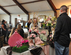 Brookside Florist discusses floral selections with attendees.