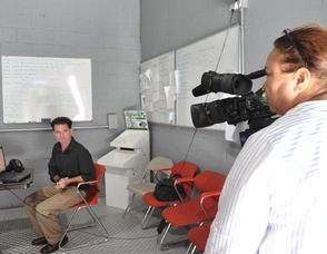 Zaida Collazo films Samuel K. Burlum, and Brian Thomas.