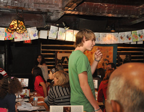 Birykov Academy Students dance through Krogh's.