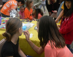 kids getting their faces painted