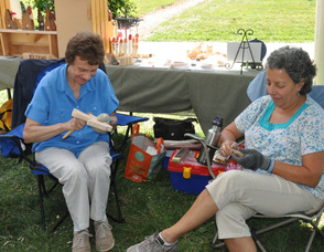 Jersey Hills Wood Carvers Agatha Sherin, and Alice Reines, busy at whittling.