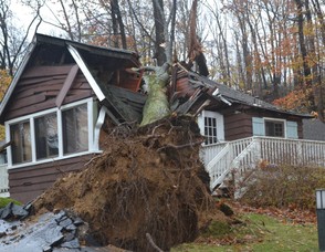 This home on #700 Block of West Shore Trail was nearly destroyed by Hurricane Sandy's ferocious wind gust last night. (Sparta Township Police Photo).