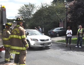 Two members of the Stillwater Area Volunteer Fire Company on the scene.