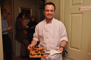 Andre de Waal with Kale Chips, one of the appetizers.