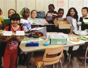 Washington Third Graders Pose with their cell projects