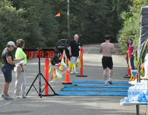 Brian Thomas passes the finish line.