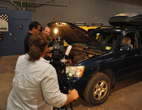 Zaida Collazo, camerawoman for "Today in America," films the team at Extreme Energy Solutions.