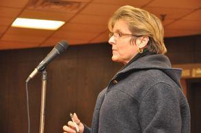 Karen Loughran asks if those who currently own land could be grandfathered in.