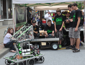 Newton High School Team 3142 Aperture demonstrates their robots.