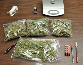Photo of seized CDS, and paraphernalia.