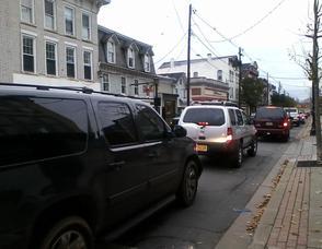 Cars heading from the square in Newton towards Lukoil.