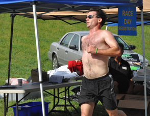 Brian Thomas nearer to the finish line.