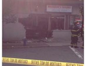 Tow Truck Plows Into Machado's Tailors on Main Street