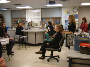Christina Grosso of Salon FiG, teaches students about 60's hairstyles.