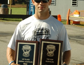 Photo of men's winner, Rob Rohen age 31, duathlon overall male winner, and Top Cop Award, overall time 52.23.2.