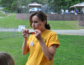 Tracy Storms Mazzucco, one of the Sussex Count Cancer Coalition volunteers, educated children about the importance of wearing sunglasses.