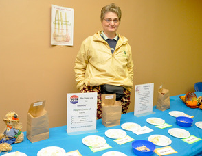 Susan Sisti of Catalpa Ridge Farm in Wantage, with the many varieties of Garlic.